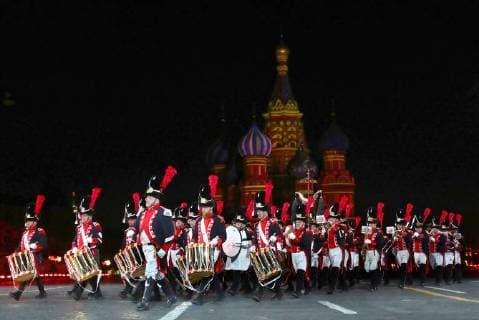 MOSCOW, RUSSIA â€“ AUGUST 24, 2018: Members of the Vieux Grenadiers of Geneva company perform at the opening of the 2018 Spasskaya Tower International Military Music Festival, in Moscow s Red Square. Anton Novoderezhkin TASS  TS08DEFE