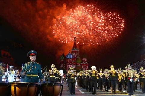 MOSCOW, RUSSIA â€“ AUGUST 24, 2018: Fireworks light up the sky as the Russian Defence Ministry s Central Military Band perform at the opening of the 2018 Spasskaya Tower International Military Music Festival, in Moscow s Red Square. Anton Novoderezhkin TASS  TS08DF0E