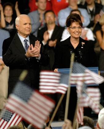 In this August 29, 2008 file photo, Republican presumptive presidential nominee Sen. John McCain (R-AZ) introduces Alaska Gov. Sarah Palin (R) as his running mate during a campaign stop in Dayton, Ohio. Senator McCain died August 28, 2018 at the age of 81.  WAX20180825216 JOHNxSOMMERSxII