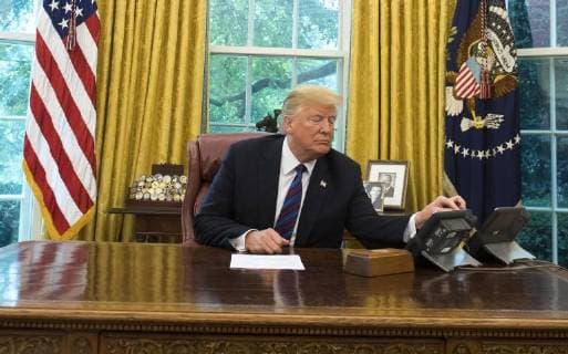 President Donald Trump speaks on a conference call with Mexican President Enrique Pena Nieto, as Trump announces a revised trade deal with Mexico he called the United States-Mexico trade agreement, in the Oval Office at the White House in Washington, D.C. on August 27, 2018. The two countries said they have revise key portions of their trade policies set up by the the North American Free Trade Agreement (NAFTA) and said Canada can join later in their deal.  WAP20180827325 KEVINxDIETSCH