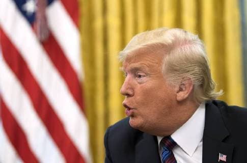 President Donald Trump speaks on a conference call with Mexican President Enrique Pena Nieto, as Trump announces a revised trade deal with Mexico he called the United States-Mexico trade agreement, in the Oval Office at the White House in Washington, D.C. on August 27, 2018. The two countries said they have revise key portions of their trade policies set up by the the North American Free Trade Agreement (NAFTA) and said Canada can join later in their deal.  WAP20180827330 KEVINxDIETSCH