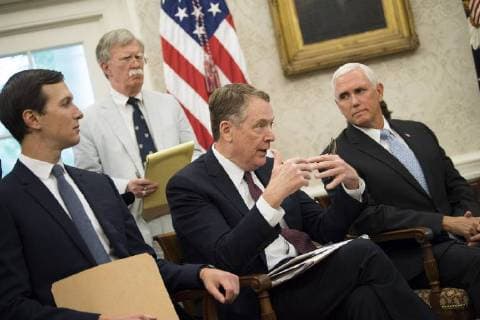 United States Trade Representative Robert Lighthizer speaks alongside, Presidential Advisor and son in-law Jared Kusher, National Security Advisor John Bolton, and Vice President Mike Pence, as President Donald Trump speaks on a conference call with Mexican President Enrique Pena Nieto, as Trump announces a revised trade deal with Mexico he called the United States-Mexico trade agreement, in the Oval Office at the White House in Washington, D.C. on August 27, 2018. The two countries said they have revise key portions of their trade policies set up by the the North American Free Trade Agreement (NAFTA) and said Canada can join later in their deal.  WAP20180827331 KEVINxDIETSCH