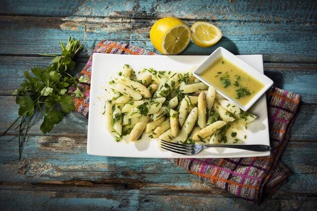 Asparagus salad with white asparagus Chives Leaf parsley in a vegetable Mustard vinegar vinaigrette asparagus salad with white asparagus chive leaf parsley in a mustard vinegar vinaigrette  1019303489
