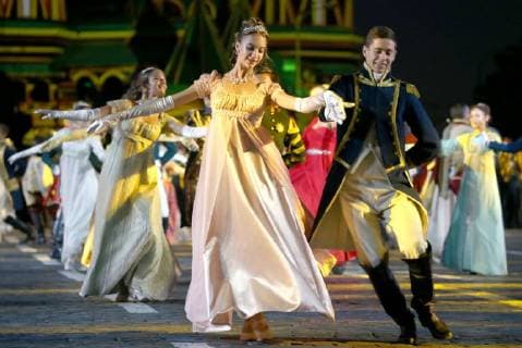 MOSCOW, RUSSIA â€“ AUGUST 31, 2018: A couple in period costumes dancing at 2018 Spasskaya Tower International Military Music Festival, in Moscow s Red Square. Marina Lystseva TASS  TS08E93E