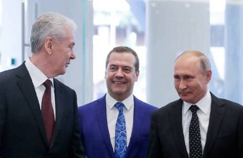 MOSCOW, RUSSIA - SEPTEMBER 8, 2018: Moscow Mayor Sergei Sobyanin, Russia s Prime Minister Dmitry Medvedev and Russia s President Vladimir Putin (L-R) attend the opening of the Zaryadye Concert Hall in Moscow s Zaryadye Park. Mikhail Metzel TASS  TS08FA0B