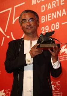 September 8, 2018 - Venice, Italy - Pema Tseden poses with Orizzonti Award for Best Screenplay Award forJinpa at the Winners Photocall during the 75th Venice Film Festival on September 8, 2018 in Venice, Italy. Venice Italy  - ZUMAn230 20180908_zaa_n230_753 Copyright: xMatteoxChinellatox