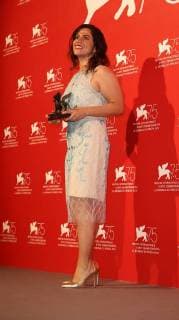 September 8, 2018 - Venice, Italy - Soudade Kaadan poses with the Lion Of The Future - Luigi De Laurentiis Venice Award for a Debut Film for The Day I Lost My Shadow (Yom Adaatou Zouli) at the Winners Photocall during the 75th Venice Film Festival on September 8, 2018 in Venice, Italy. Venice Italy  - ZUMAn230 20180908_zaa_n230_735 Copyright: xMatteoxChinellatox