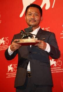 September 8, 2018 - Venice, Italy - Phuttiphong Aroonpheng poses with the Orizzonti Award for Best Film for Kraben Rahu (Manta Ray) at the Winners Photocall during the 75th Venice Film Festival on September 8, 2018 in Venice, Italy. Venice Italy  - ZUMAn230 20180908_zaa_n230_726 Copyright: xMatteoxChinellatox