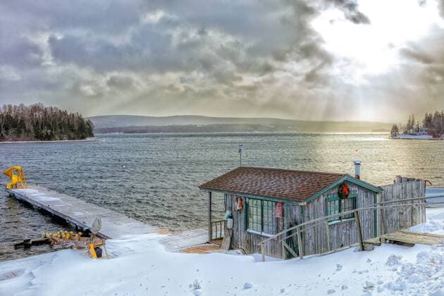 Boathouse in winter, Baddeck, Cape Breton, Nova Scotia, Canada  acp115367 Barrettx&xMackay