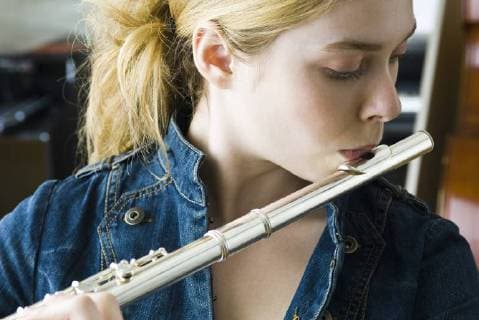 Flautist practicing  Copyright: MichèlexConstantini B63098806