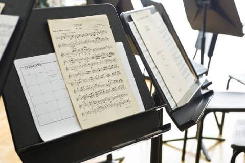 Sheet music on music stand  Copyright: MichèlexConstantini B66397606