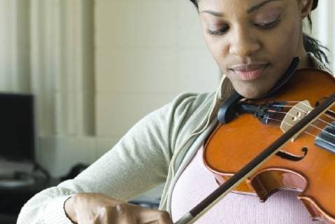Violinist practicing  Copyright: MichèlexConstantini B66598606