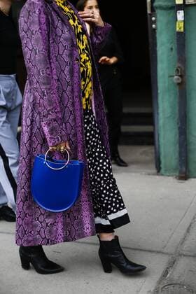 A chic showgoer posing on the street outside of the Eckhaus Latta show during New York Fashion Week - Sept 8, 2018 - NYFW: Spring 2019 Street Style Day 3, New York New York United States  Copyright: xValentinaxRanierix h_00541604