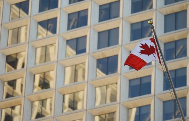 August 14, 2018 - Canada - A view of a Canadian National Flag attached to an office tower in Edmonton s downtown..On Tuesday, September 11, 2018, in Edmonton, Alberta, Canada. Canada  - ZUMAn230 20180814_zaa_n230_484 Copyright: xArturxWidakx