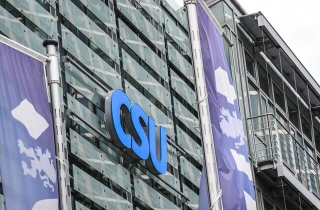 CSU logo and CSU flags on Franz Josef Strauss CSU headquarters in Munich