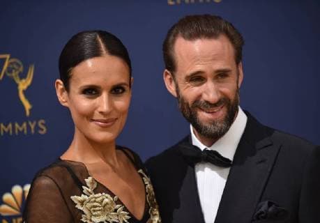 Actors Maria Dolores Dieguez (L) and Joseph Fiennes attend the 70th annual Primetime Emmy Award at the Microsoft Theater in downtown Los Angeles on September 17, 2018.  LAP20180917032 CHRISTINExCHEW