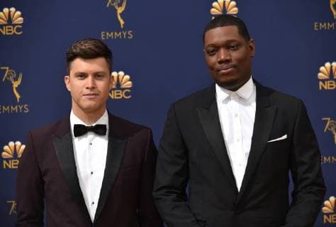 Comedians Colin Jost (L) and Michael Che attend the 70th annual Primetime Emmy Award at the Microsoft Theater in downtown Los Angeles on September 17, 2018.  LAP20180917035 CHRISTINExCHEW
