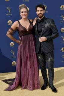 Actor Darren Criss (R) and Mia Swier attend the 70th annual Primetime Emmy Awards at the Microsoft Theater in downtown Los Angeles on September 17, 2018.  LAP20180917547 CHRISTINExCHEW