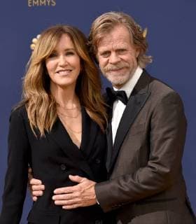 Actors Felicity Huffman (L) and William H. Macy attend the 70th annual Primetime Emmy Award at the Microsoft Theater in downtown Los Angeles on September 17, 2018.  LAP20180917039 CHRISTINExCHEW