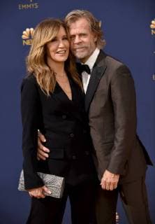Actors Felicity Huffman (L) and William H. Macy attend the 70th annual Primetime Emmy Award at the Microsoft Theater in downtown Los Angeles on September 17, 2018.  LAP20180917041 CHRISTINExCHEW