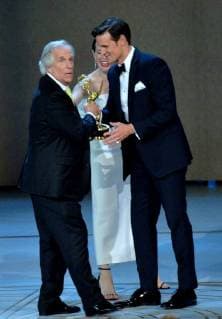 Henry Winkler (L) accepts the Outstanding Supporting Actor in a Comedy Series award for Barry from Claire Foy and Matt Smith onstage during the 70th annual Primetime Emmy Awards at the Microsoft Theater in downtown Los Angeles on September 17, 2018.  LAP20180917572 JIMxRUYMEN