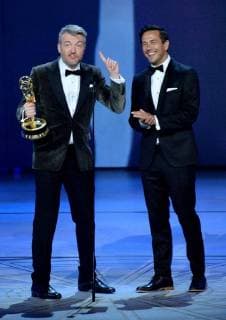 Charlie Brooker (L) and William Bridges accept the Outstanding Writing for a Limited Series, Movie, or Dramatic Special award for Black Mirror: USS Callister , onstage during the 70th annual Primetime Emmy Awards at the Microsoft Theater in downtown Los Angeles on September 17, 2018.  LAP20180917988 JIMxRUYMEN