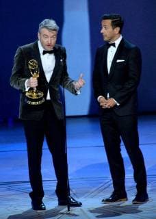 Charlie Brooker (L) and William Bridges accept the Outstanding Writing for a Limited Series, Movie, or Dramatic Special award for Black Mirror: USS Callister , onstage during the 70th annual Primetime Emmy Awards at the Microsoft Theater in downtown Los Angeles on September 17, 2018.  LAP201809171012 JIMxRUYMEN