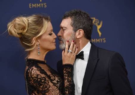 Actor Antonio Banderas (R) and Nicole Kimpel attend the 70th annual Primetime Emmy Awards at the Microsoft Theater in downtown Los Angeles on September 17, 2018.  LAP201809171507 CHRISTINExCHEW