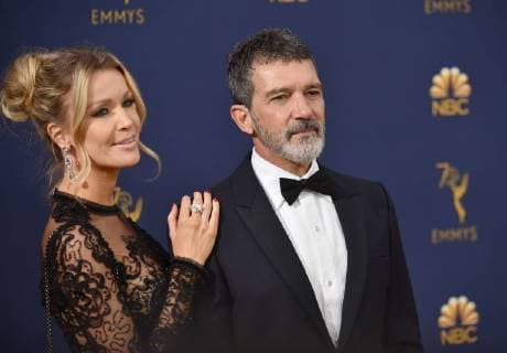 Actor Antonio Banderas (R) and Nicole Kimpel attend the 70th annual Primetime Emmy Awards at the Microsoft Theater in downtown Los Angeles on September 17, 2018.  LAP201809171508 CHRISTINExCHEW