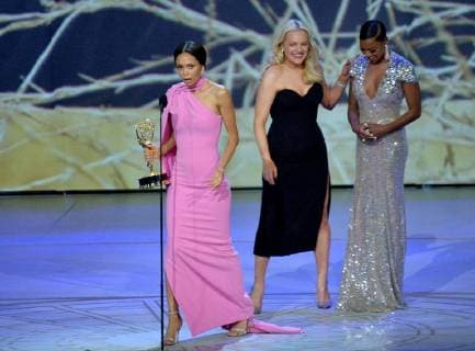 Elisabeth Moss (L) and Samira Wiley present the award to Thandie Newton onstage during the 70th annual Primetime Emmy Awards at the Microsoft Theater in downtown Los Angeles on September 17, 2018.  LAP201809171034 JIMxRUYMEN