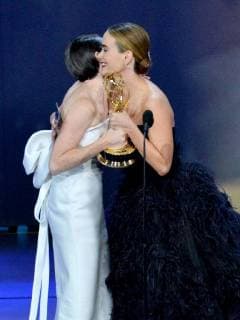 Claire Foy accepts the award for Outstanding Lead Actress in a Drama Series The Crown from presenter Sarah Paulson onstage during the 70th annual Primetime Emmy Awards at the Microsoft Theater in downtown Los Angeles on September 17, 2018.  LAP201809171062 JIMxRUYMEN