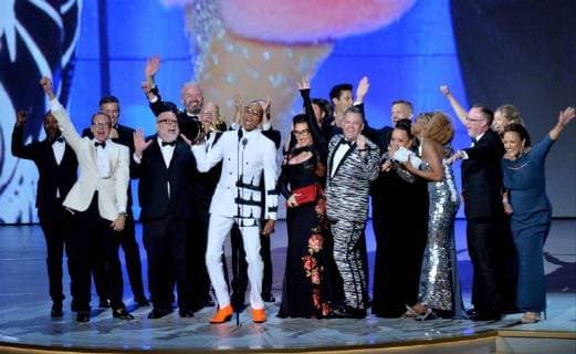 RuPaul (C) and cast and crew accept the Outstanding Reality-Competition Program for RuPaul s Drag Race onstage during the 70th annual Primetime Emmy Awards at the Microsoft Theater in downtown Los Angeles on September 17, 2018.  LAP201809171078 JIMxRUYMEN