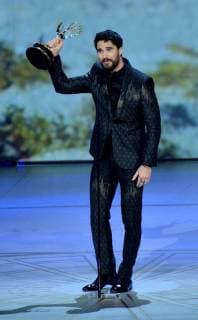 Darren Criss accepts the Outstanding Lead Actor in a Limited Series or Movie award for The Assassination of Gianni Versace: American Crime Story onstage during the 70th annual Primetime Emmy Awards at the Microsoft Theater in downtown Los Angeles on September 17, 2018.  LAP201809171089 JIMxRUYMEN