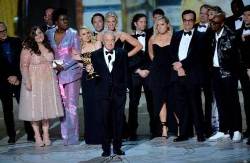 Lorne Michaels (C) and cast accepts the Outstanding Variety Sketch Series award for Saturday Night Live onstage during the 70th annual Primetime Emmy Awards at the Microsoft Theater in downtown Los Angeles on September 17, 2018.  LAP201809171071 JIMxRUYMEN