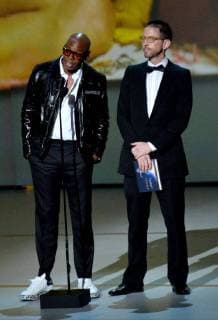 Dave Chappelle (L) and Neal Brennan speak onstage during the 70th annual Primetime Emmy Awards at the Microsoft Theater in downtown Los Angeles on September 17, 2018.  LAP201809171081 JIMxRUYMEN