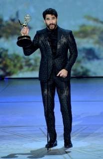 Darren Criss accepts the Outstanding Lead Actor in a Limited Series or Movie award for The Assassination of Gianni Versace: American Crime Story onstage during the 70th annual Primetime Emmy Awards at the Microsoft Theater in downtown Los Angeles on September 17, 2018.  LAP201809171087 JIMxRUYMEN