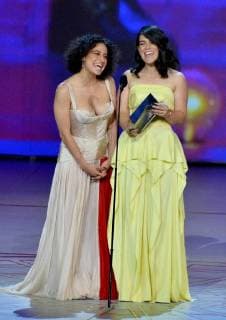 Ilana Glazer (L) and Abbi Jacobson appear onstage during the 70th annual Primetime Emmy Awards at the Microsoft Theater in downtown Los Angeles on September 17, 2018.  LAP201809171092 JIMxRUYMEN