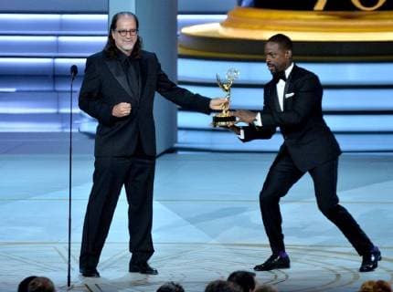 Glenn Weiss (L), winner of the Outstanding Directing for a Variety Special award for The Oscars and Sterling K. Brown appear onstage during the 70th annual Primetime Emmy Awards at the Microsoft Theater in downtown Los Angeles on September 17, 2018.  LAP201809171106 JIMxRUYMEN