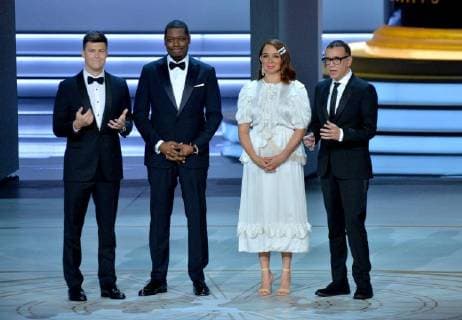 (L-R) Colin Jost, Michael Che, Maya Rudolph, and Fred Armisen appear onstage during the 70th annual Primetime Emmy Awards at the Microsoft Theater in downtown Los Angeles on September 17, 2018.  LAP201809171128 JIMxRUYMEN