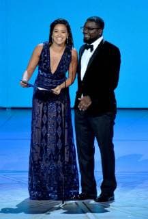 Gina Rodriguez (L) and Lil Rel Howery appear onstage during the 70th annual Primetime Emmy Awards at the Microsoft Theater in downtown Los Angeles on September 17, 2018.  LAP201809171108 JIMxRUYMEN