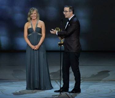 John Oliver and Liz Stanton accept the Outstanding Variety Talk Series award for Last Week Tonight with John Oliver onstage during the 70th annual Primetime Emmy Awards at the Microsoft Theater in downtown Los Angeles on September 17, 2018.  LAP201809172000 JIMxRUYMEN