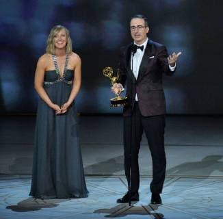 John Oliver and Liz Stanton accept the Outstanding Variety Talk Series award for Last Week Tonight with John Oliver onstage during the 70th annual Primetime Emmy Awards at the Microsoft Theater in downtown Los Angeles on September 17, 2018.  LAP201809172001 JIMxRUYMEN