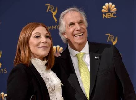 Stacey Weitzman (L) and Henry Winkler attend the 70th annual Primetime Emmy Award at the Microsoft Theater in downtown Los Angeles on September 17, 2018.  LAP201809171138 CHRISTINExCHEW