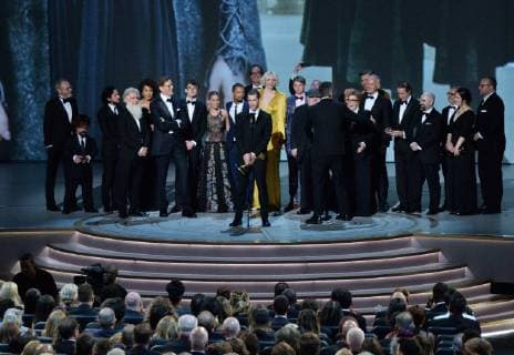 Writer-producers D.B. Weiss (C) and David Benioff (R) and the cast of Game of Thrones accept the award Outstanding Drama series onstage during the 70th annual Primetime Emmy Awards at the Microsoft Theater in downtown Los Angeles on September 17, 2018.  LAP201809172013 JIMxRUYMEN