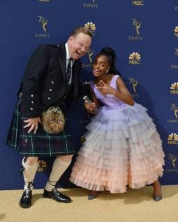 Actors Peter Mackenzie (L) and Marsai Martin attend the 70th annual Primetime Emmy Award at the Microsoft Theater in downtown Los Angeles on September 17, 2018.  LAP201809171184 CHRISTINExCHEW