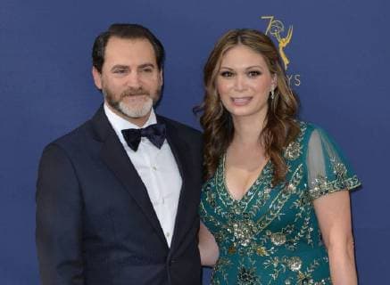 Actor Michael Stuhlbarg (L) and Mai-Linh Lofgren attend the 70th annual Primetime Emmy Award at the Microsoft Theater in downtown Los Angeles on September 17, 2018.  LAP201809171216 CHRISTINExCHEW