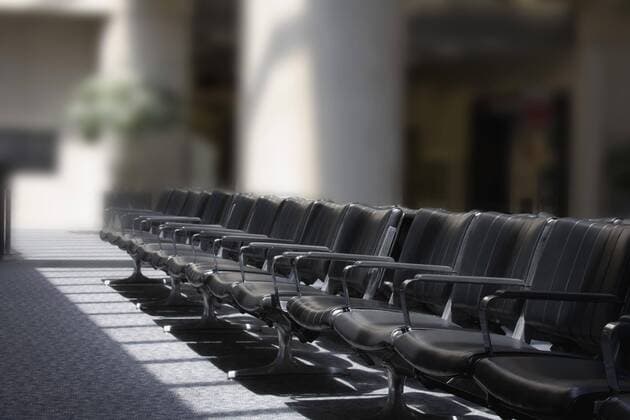 Empty seats in an airport lounge  Copyright: SeanxRussell fStopImages653012