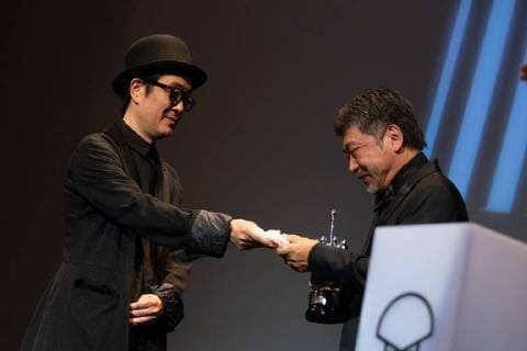 September 23, 2018 - San Sebastian, Spain - Lily Franky (L) and Japanese director Hirokazu Kore-Eda receives the Donostia Award in recognition of his prestigious film career during the 66th San Sebastian Film Festival, in the northern Spanish Basque city of San Sebastian on September 23, 2018. San Sebastian Spain  - ZUMAn230 20180923_zaa_n230_1095 Copyright: xManuelxRomanox