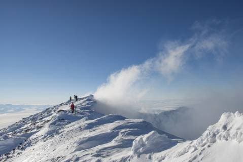 Scientists walk around the crater rim of the active volcano Mount Erebus, Antarctica., Ross Island Ross Sea Antarctica Copyright: AlasdairxTurner 5040000026