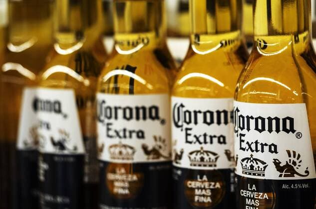 September 26, 2018 - Kiev, Ukraine - Detail of lined up Corona beer bottles seen on the store shelf. Corona extra Lager Beer is the flagship product of the Mexican company Grupo Modelo Kiev Ukraine - ZUMAs197 20180926_zab_s197_019 Copyright: xIgorxGolovniovx
